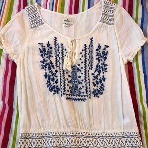 American Eagle peasant top with blue embroidery